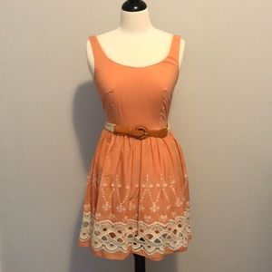 Darling peach sundress with eyelet details